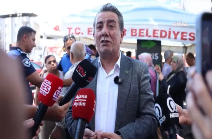 Aydın Büyükşehir Belediyesi ekipleri, Efeler Belediyesi'nin Zafer Meydanı'nda aşure hayrına izin vermedi